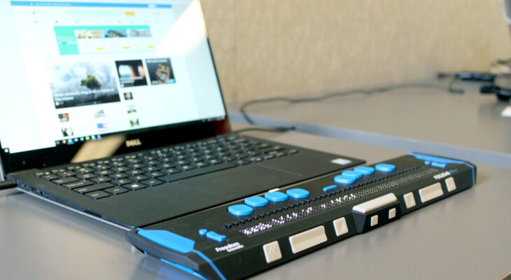 A laptop with a screen reader