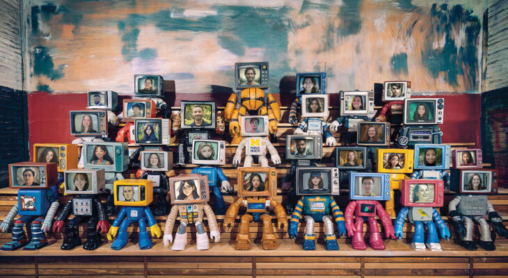 Group of toy-like robots with vintage TV heads showing the human and illustrated faces representing the students who took the inaugural Public Health 555 course, "ChatGPT/AI and Public Health," posed in tiered rows. This photo illustration served as a class picture for the course.