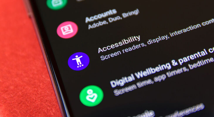 A smartphone screen displays the "Accessibility" settings option, including a purple icon and text mentioning screen readers and display settings.